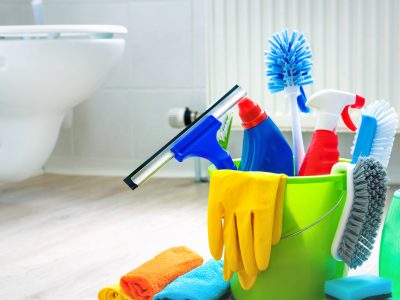 Various,Cleaning,Items,And,Supplies,In,A,Bucket,On,The